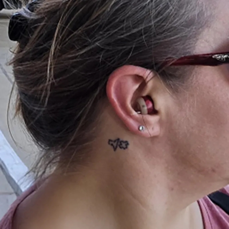 Gebruiker met Snugwear verwarmde schouder- en nekcape