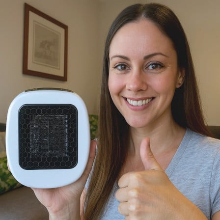 Gebruiker geniet van de warmte van de HeatNest